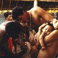 CCPY doctor examines a sick Yanomami child, Balaú, Brazil. &copy; Fiona Watson/Survival