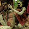 Ogiek children paint themselves for ceremonies, Kenya. &copy; Survival International