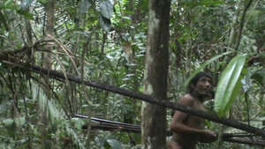 The last of the Kawahiva are forced to live on the run from armed loggers and powerful ranchers (image taken during a chance encounter with Brazilian government agents). 