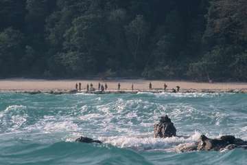 Sentinelese on a beach, seen from a boat in 2006