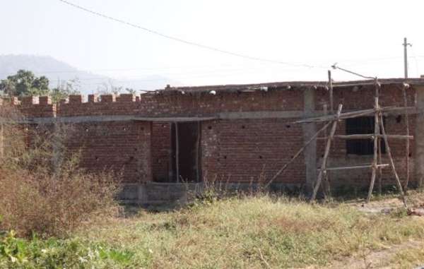 Facilities in the new government settlements are inadequate. This unfinished building was supposed to serve as a school for tribal children who were moved there more than seven years ago.