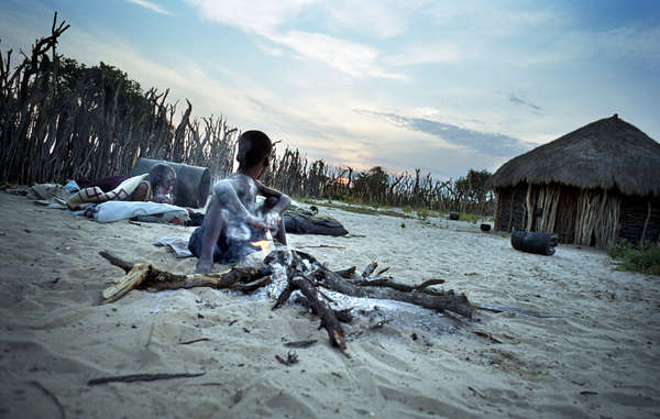 Dawn breaks on a Bushmen settlement inside the CKGR on the morning after the return of the first Bushmen since their successful court chanlenge to their evictions five years before.