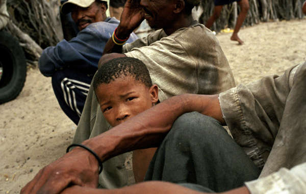 Bushmen in Molapo, a settlement inside the CKGR, greet family members and friends who have just returned from exile in New Xade.