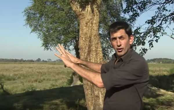 The BBC's Justin Rowlatt, reporting from Kaziranga's unmarked boundaries for his report on conservation in the park. A tribal man was shot for crossing this line to retrieve stray cattle.