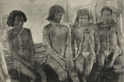 http://assets.survivalinternational.org/pictures/1296/putumayo-indians-in-chains_news_medium.jpg