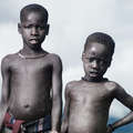 Oral traditions of the Bodi tribe are shared with children from a young age, Ethiopia. &copy; Joey L/Survival