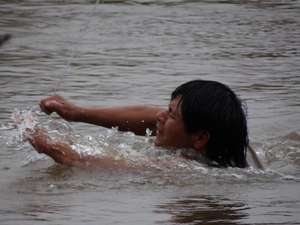 The Guarani are forced to make a perilous river crossing using a narrow cable to get food supplies.