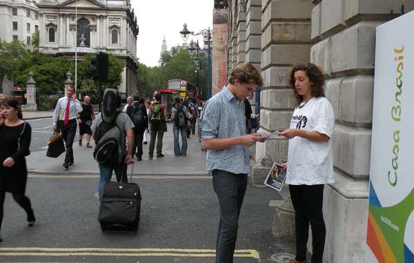 Visitors to the Rio 2016 exhibition in London read leaflets about threats to Brazil’s Awá.