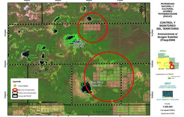 Foto satélite que muestra la deforestación ilegal (marcada con círculos) por los terratenientes brasileños dentro del territorio de los totobiegosode, Paraguay.