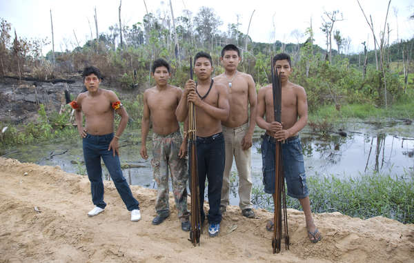 Members of the Awá have made a rare trip to Brasilia to urge Brazil to evict illegal invaders.