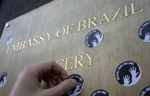 Stickers with the demand ‘Brazil: Save the Awá’, will be used during Survival's worldwide protest.