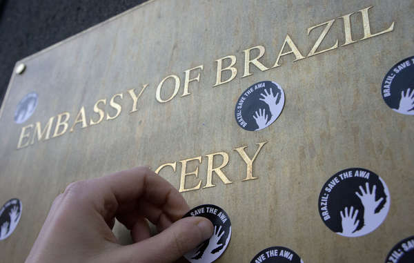 Stickers with the demand ‘Brazil: Save the Awá’, will be used during Survival's worldwide protest.