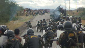 Police-attack-protesters_300_wide
