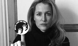 Hollywood star Gillian Anderson brandishes the awáIcon which sends the urgent message, 'Brazil: Save the Awá'.