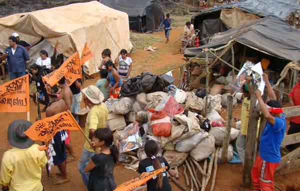 The Guarani of Laranjeira Ñanderu are forced to camp by the side of a road after being evicted from their land.
