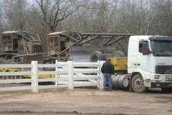 Bulldozers being brought in for illegal deforestation in territ