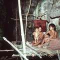 A family of Tau’t Batu (People of the Cave) at the entrance of Pangi-Pangi cave, in Singnapan Valley. &copy; Dario Novellino
