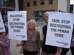 Chief Minister Taib Mahmud was met by demonstrators protesting at the destruction of the Penan's rainforest.