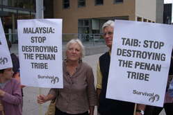 Chief Minister Taib Mahmud was met by demonstrators protesting at the destruction of the Penan's rainforest. 