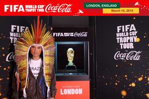 Nixiwaka Yawanawá wore a T-shirt saying ‘BRAZIL: STOP DESTROYING INDIANS’, but Coca-Cola and FIFA prevented him from displaying the full message while standing next to the trophy.