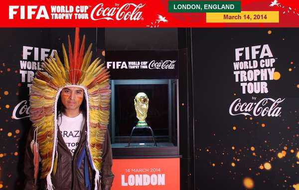 Nixiwaka Yawanawá wore a T-shirt saying ‘BRAZIL: STOP DESTROYING INDIANS’, but Coca-Cola and FIFA prevented him from displaying the full message while standing next to the trophy.