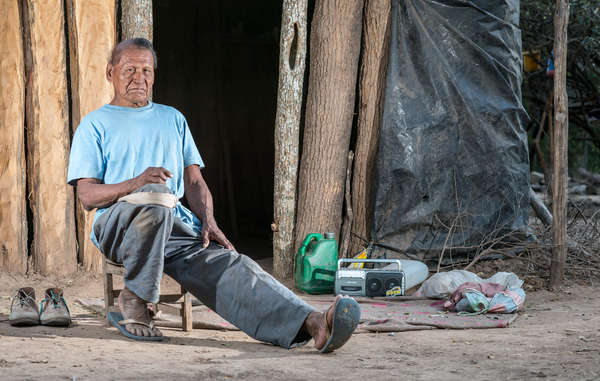 Eroi was forced out of his forest in 1986. He was a shaman, but he stopped because the missionaries told him that shamanism was the work of the devil.
