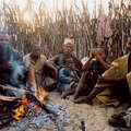 A Bushman family outside their home in the Central Kalahari Game Reserve, Botswana. &copy; Lottie Davies/Survival