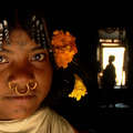 Mitu, a Dongria Kondh girl, outside her house in Orissa, India.
 &copy; Survival