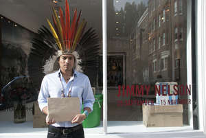 Nixiwaka Yawanawá protested against the 'outrageous' exhibition of Jimmy Nelson's work at London's Atlas Gallery, wearing his ceremonial headdress.
