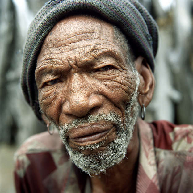 A Bushman grandfather.

Today’s Bushman tribes are genetically closer to the ancestors of all of us than anyone else; yet they are also amongst the most victimized peoples in the history of southern Africa. Between 1997 and 2002, many Bushmen were forced from their homes in the Central Kalahari Game Reserve (CKGR) and taken to eviction camps outside the reserve. 

The Bushmen took the Botswana government to court. In 2006, following an international campaign by Survival International, and in a landmark victory for tribal peoples the world over,  they won the right to return home.