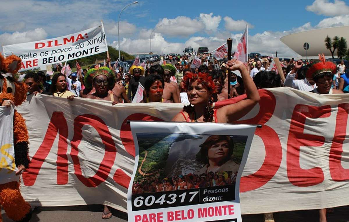 Indigenous people from the Amazon protesting in Brasília against the Belo Monte mega-dam project, Brazil. Numerous tribal peoples' lives and livelihood are under threat due to the construction of this dam, which would be the world's third largest dam upon completion.