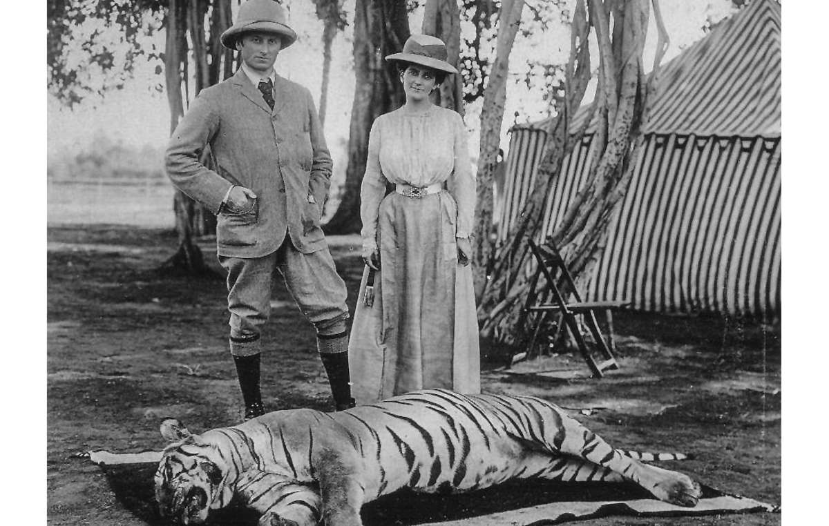 Lord Curzon, viceroy of India, and his wife, pose after a tiger hunt. India, 1902. Hunting by the Raj elite was the main reason for the decline of the Bengal tiger, yet many conservation efforts are now directed at tribal peoples.