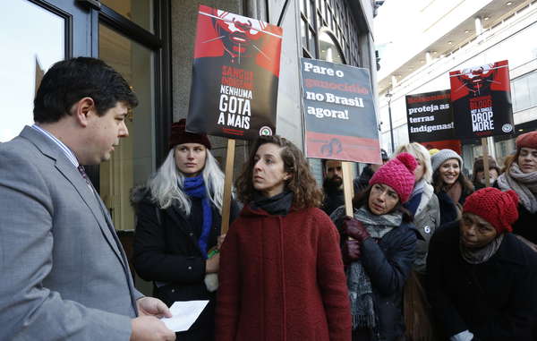 Protesters handed in a letter to Brazilian Embassy officials calling on President Bolsonaro to abandon his crackdown on indigenous rights.