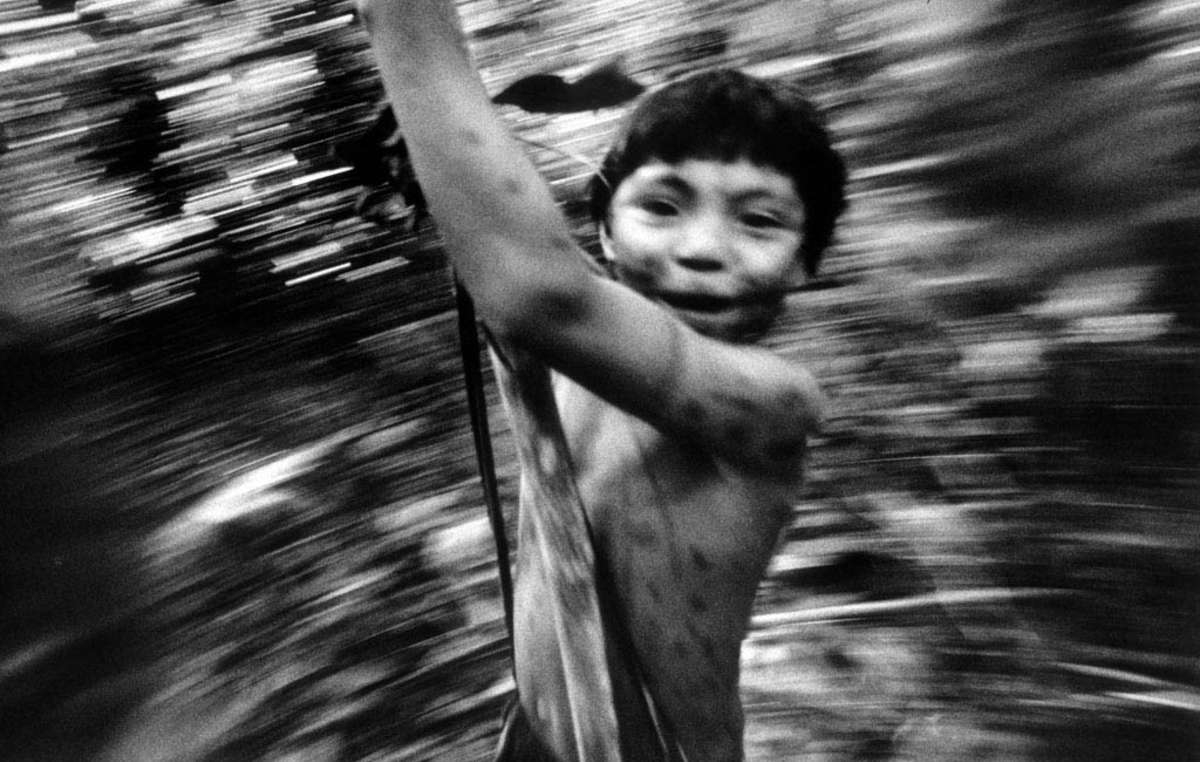 Yanomami boy in the rainforest, Brazil.