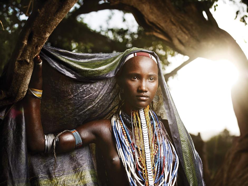 Arbore women are well known for their long headdresses. The girls shave their heads to indicate virginity, and only start growing hair after marriage.

_This picture is "available as a greetings card":http://shop.survivalinternational.org/products/joey-l-greetings-cards, with all profits going to Survival's campaigns._