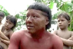 Suruwaha man and children with body paint, Brazil.