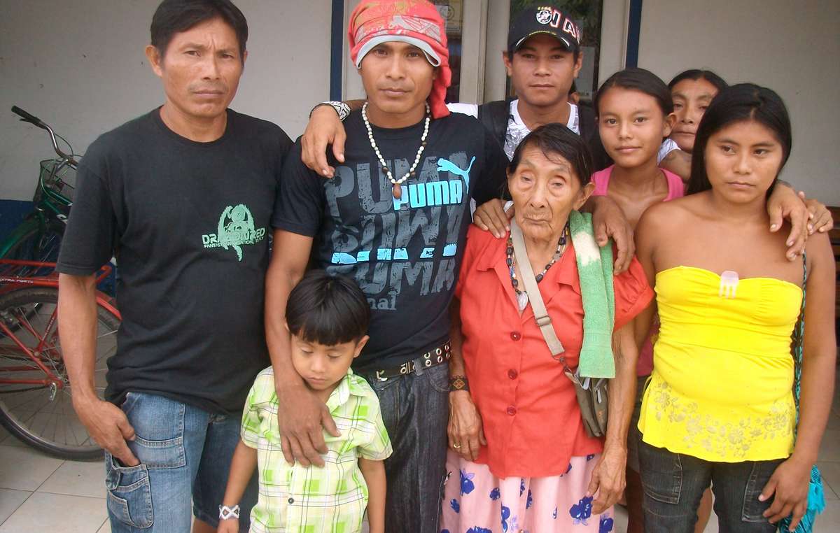 Maria Lucimar Pereira of the Kaxinawá tribe standing with members of her family. She is thought to be the oldest person in the world - she celebrated her 121st birthday in 2011.