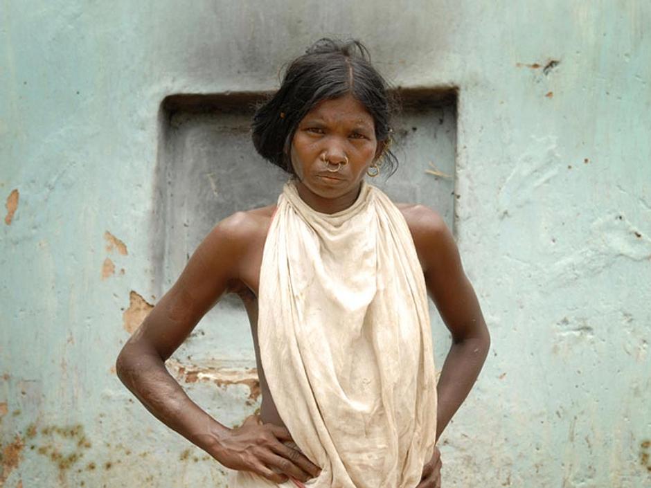 To be a Dongria Kondh woman of the Niyamgiri hills in Odisha state, India, is to be intimately connected to one's homeland; they have lived  successfully in the lush forested hills with their perennial streams and giant jackfruit trees for millennia.  They call themselves _Jharnia_, or, _protectors of streams_.

For the past 10 years Dongria Kondh women have been standing shoulder to shoulder with Dongria men to protect Niyamgiri against devastating plans by British mining giant, Vedanta Resources, to construct an open-pit bauxite mine on their most sacred mountain, Niyam Dongar, the 'mountain of law'. At one time they formed a human chain around the base of the mountain to prevent Vedanta's bulldozers from destroying it. 

In August 2013 the Dongria Kondh overwhelmingly rejected the plans by notorious British mining giant Vedanta Resources for an open-pit bauxite mine in their sacred Niyamgiri Hills - an unprecedented triumph for tribal rights. Many of the Dongria's key figures - those who had  protested loudly, travelled over 1,600 kilometers to Delhi, demanded that police release arrested leaders - have been women. 

_We will not give our forests to anybody_, said one Dongria woman.  _All the women here are prepared to go to jail for this_. 

In January 2014, their persistence paid off: the Indian government announced that the mine would not be approved.



