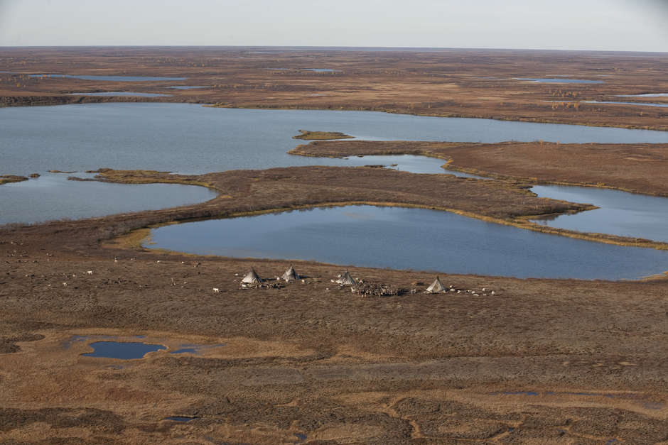 The Yamal Peninsula: a stretch of peatland that extends from northern Siberia into the Kara Sea, far above the Arctic Circle. To the east lie the shallow waters of the Gulf of Ob; to the west, the Baydaratskaya Bay, which is ice-covered for most of the year.

Yamal in the language of the indigenous Nenets means _the end of the world_; it is a remote, wind-blasted place of permafrost, serpentine rivers and dwarf shrubs, and has been home to the reindeer-herding Nenets people for over a thousand years.  

Today, the Nenets' nomadic way of life is under threat from the effects of climate change, making the tundra increasingly unpredictable - and the discovery that the peninsula contains the largest gas reserves on the planet.

