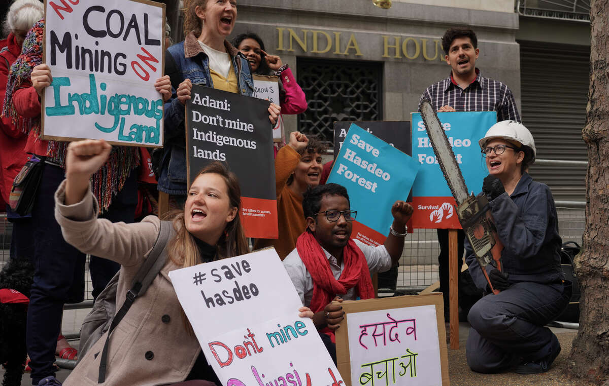 Protestors gather outside Indian High Commission in London to protest against coal mining in Hasdeo Forest, India, as part of a global day of solidarity.