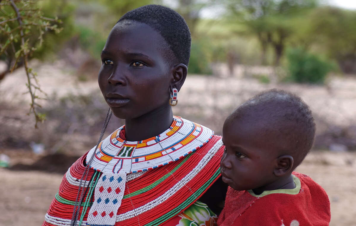 Samburu woman, Northern Kenya. One of her family members was killed when grazing his animals near an NRT conservancy, allegedly at the hands of NRT park rangers.