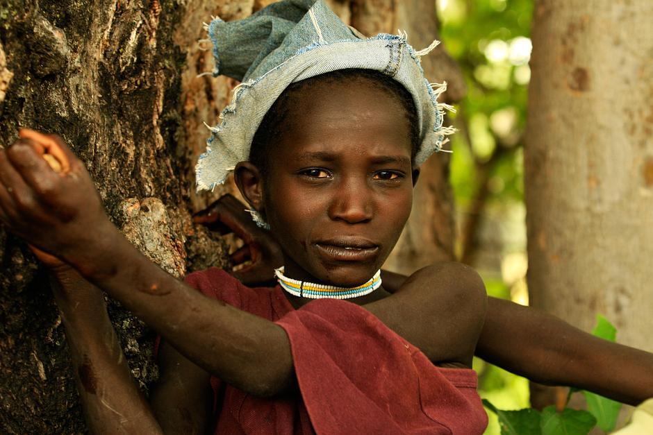 The Hadza's homeland lies on the edge of the Serengeti plains, in the shadow of Ngorongoro Crater.  It is also close to Olduvai Gorge, one of the most important prehistoric sites in the world, where homo habilis - one of the earliest members of the genus Homo - was discovered to have lived 1.9 million years ago. 

The Hadza have probably lived in the Yaeda Chini area for millennia. Genetically - like the Bushmen of southern Africa - they are one of the 'oldest' lineages of humankind.  

They speak a _click_ language that is unrelated to any other language on earth.

Over the past 50 years, however, the tribe has lost 90% of its land.