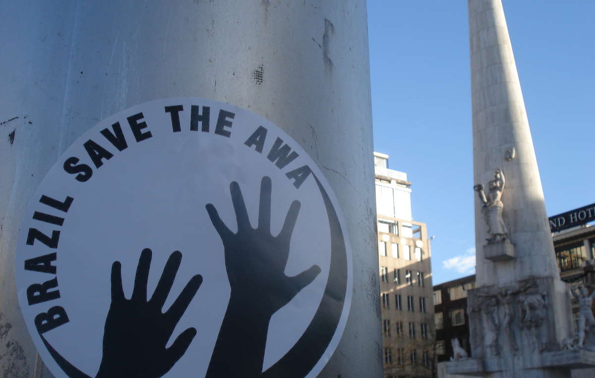 Activists in the Netherlands placed stencils of ‘Save the Awá’ around Dam square in Amsterdam.