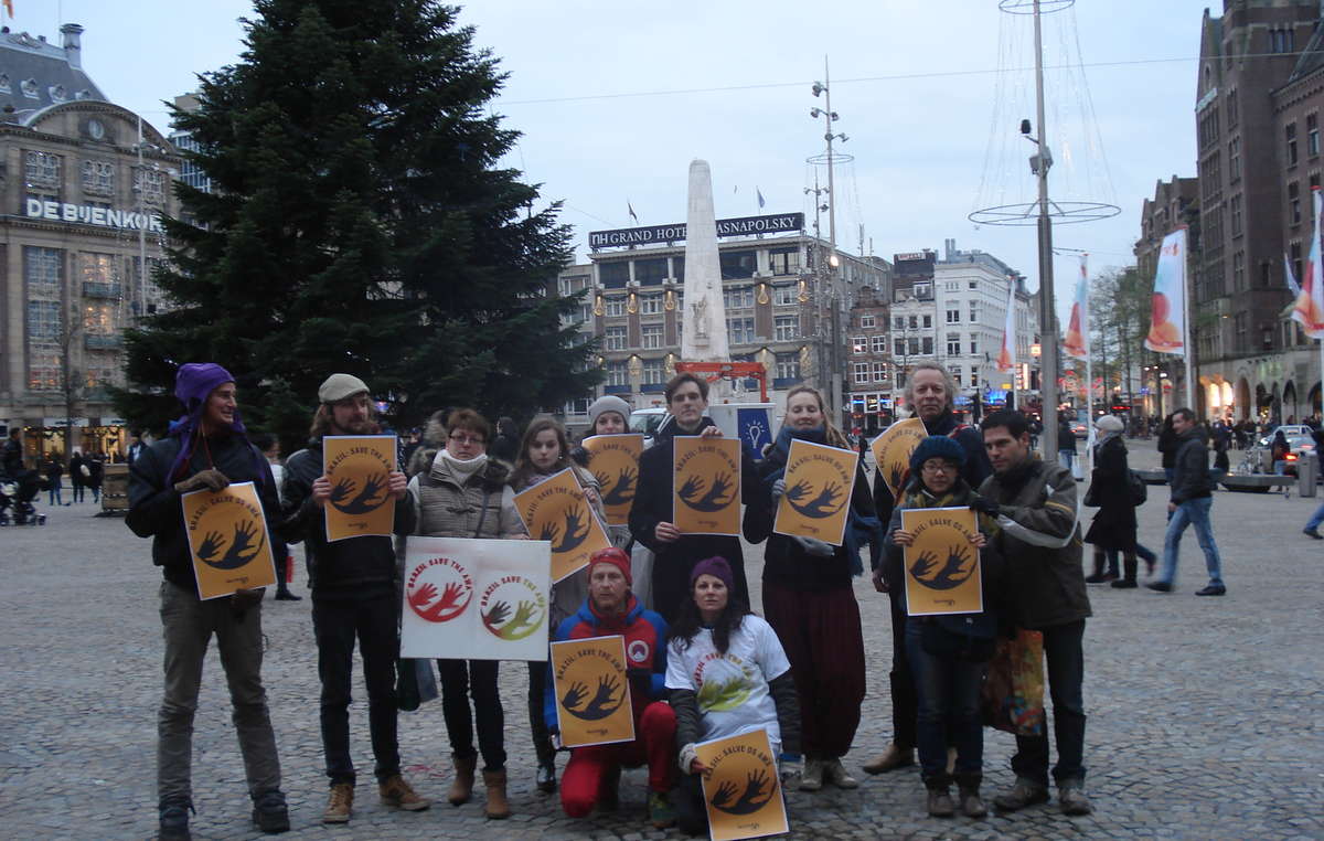Protesters gathered on Dam Square in Amsterdam, Holland, to call on Brazil to save the Awá.