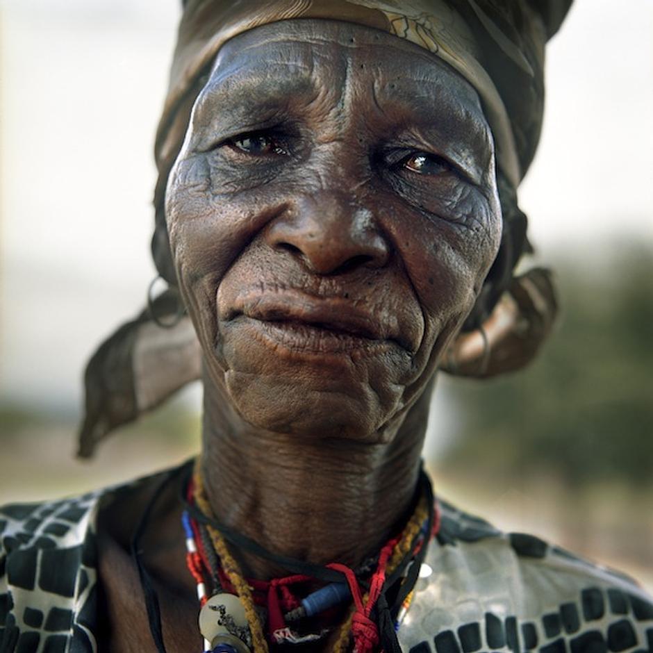 The Bushmen are the original people of southern Africa.

Between 1997 and 2002 almost all Bushmen were taken from their homes in the Central Kalahari Game Reserve and driven to eviction camps outside the reserve, where they were not only deprived of their ways of life, but humiliated by endemic racist attitudes. 

_Let them call us primitive. Let them call us Stone Age people. Our way of life suits us. We have seen their development, and we don’t like it_, said a Bushman woman.

Xlarema Phuti, a Bushman woman healer, was forcibly evicted by the government from Molapo, to New Xade, a government eviction camp known as 'the place of death'.  Xlarema talked to Survival International about the healing powers of the Bushman's traditional trance dance, and the sadness she has experienced since being evicted from her lands.

_When I'm dancing in the trance dance I talk with the ancestors to help me heal the sick person_, she said.