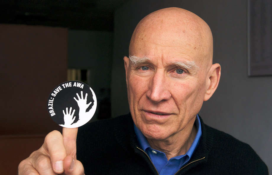 Brazilian photographer Sebastião Salgado.

Dozens of celebrities, such as Hollywood actress Gillian Anderson, fashion designer Vivienne Westwood and musician Julian Lennon pledged their support for the campaign.

Brazil's Justice Minister received 57,000 emails from supporters demanding that the Brazilian government remove the invaders and protect the Awá's land. 

Supporters from 38 countries brandished the 'awáicon' (seen above), a Survival sticker promoting the Awá's plight.