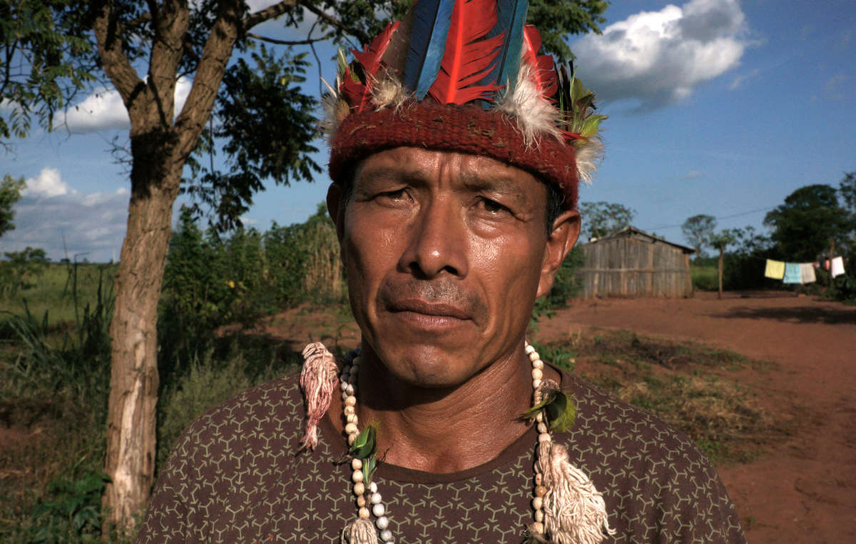 Guarani man. Tribes across Brazil are expressing their anger at a draft bill which would open up their territories for industrial projects.
