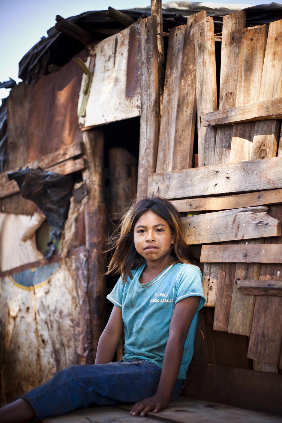 The Guarani in Brazil are thought to have been one of the first peoples to be contacted after Europeans arrived in South America. 

They once occupied a homeland of forest and plains in Brazil totaling some 217,000 square miles; today, having lost most of their land, they are squeezed onto tiny patches of land surrounded by cattle ranches and vast fields of soya and sugar cane.  Some have no land at all, and live camped by roadsides.  

Over the past 30 years more than 625 Guarani Indians have killed themselves. The majority of the victims are between 15 and 29 years old, but the youngest recorded victim was just 9.
