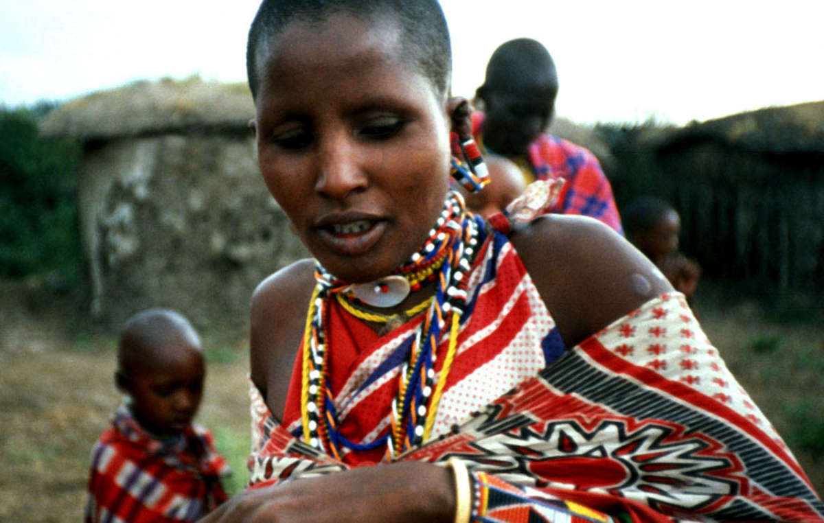 Maasai at the cultural ‘manyatta’ of Maasai Mara Game Reserve, Kenya.