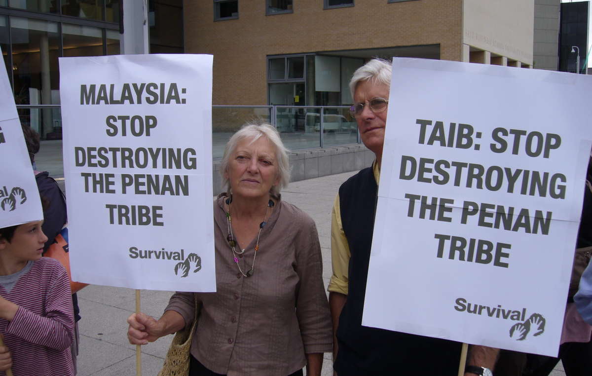 Chief Minister Taib Mahmud was met by demonstrators protesting at the destruction of the Penan's rainforest.